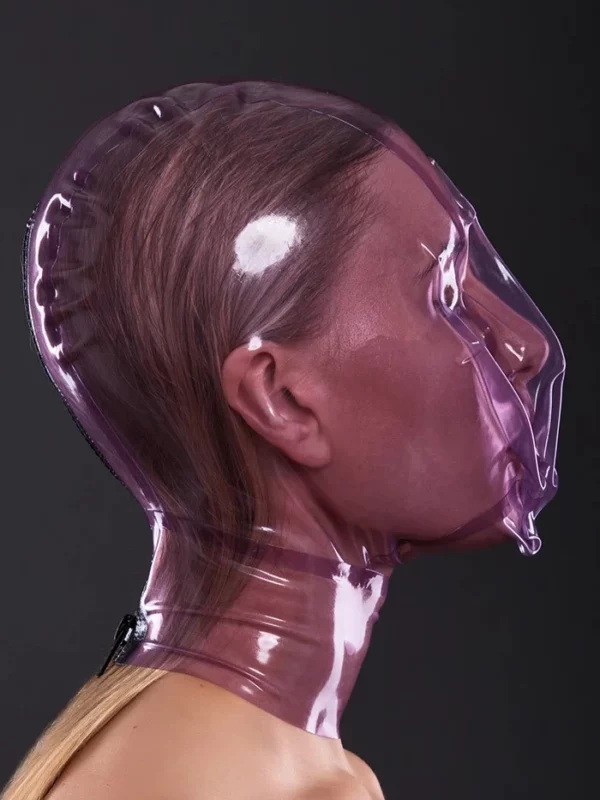 Latex ecstasy mask with a small hole for breath control